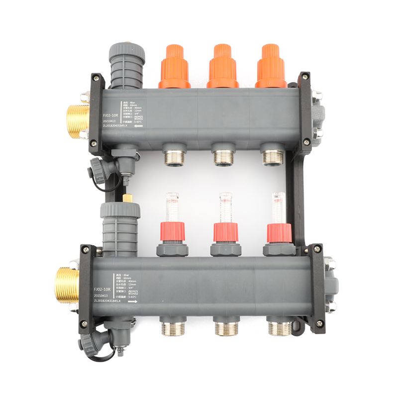 The two branches of the floor heating manifold are equipped with water flow controllers