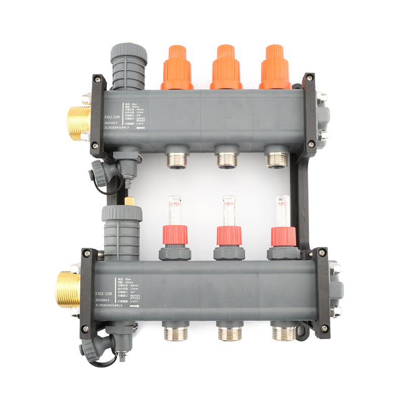 The two branches of the floor heating manifold are equipped with water flow controllers